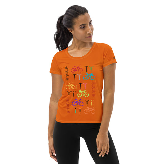 Image of an orange athletic t-shirt for women with bicycle and chain designs.
