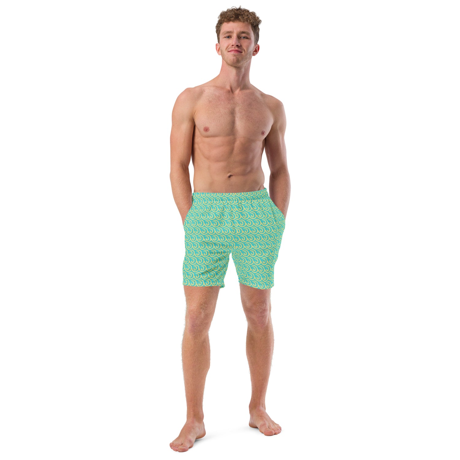 Image of a light green swim trunk with a printed pattern of a yellow sun outline.