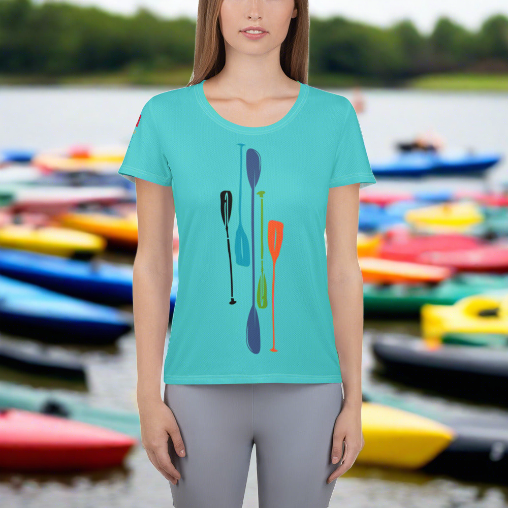 Image of a bright blue athletic t-shirt with paddles designs.