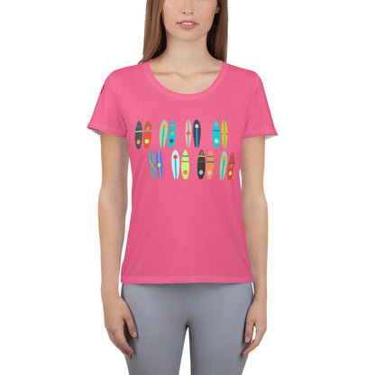 Image of a pink athletic t-shirt with kayak and paddle boards designs.