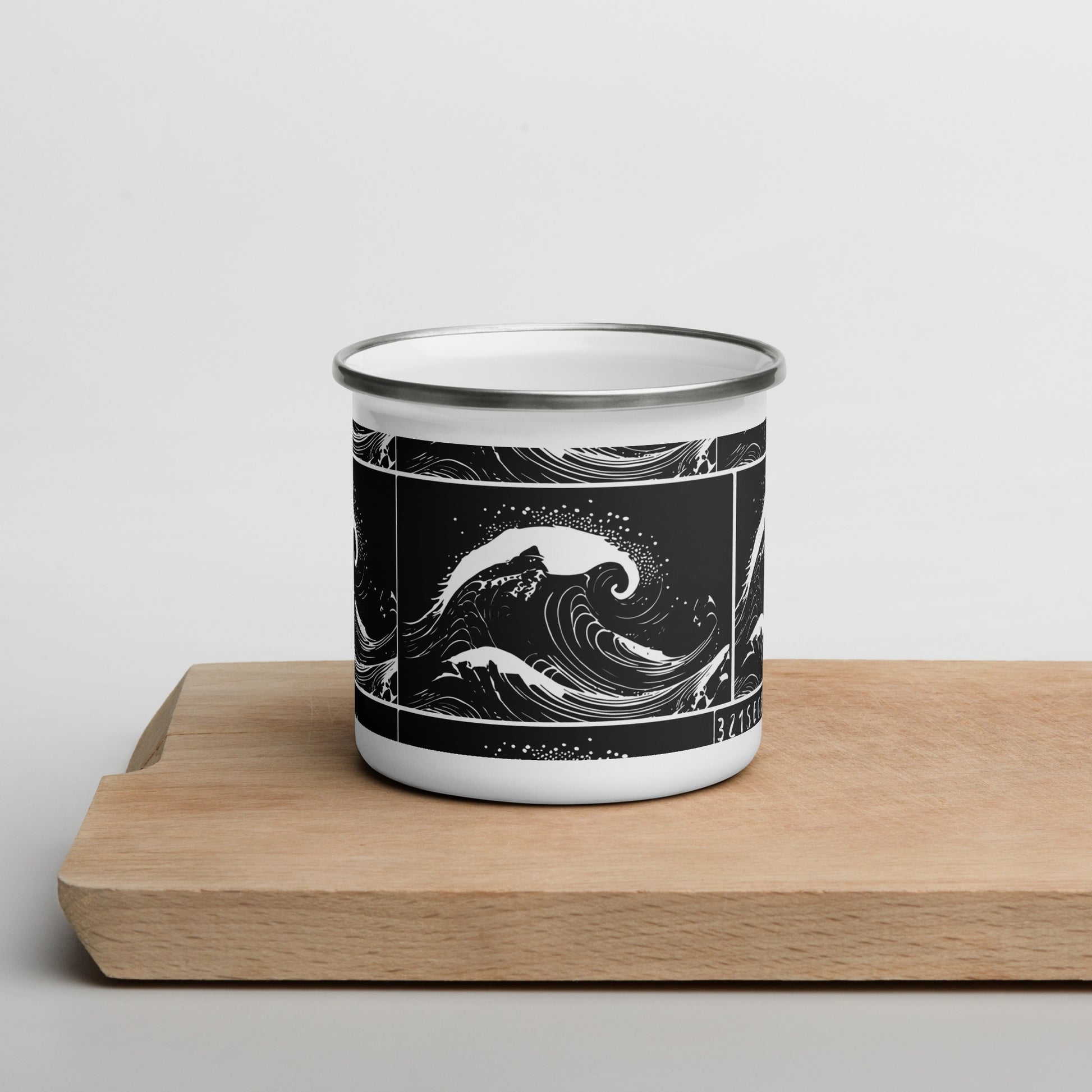 Image of a white metal mug with an AI generated scene of a black and white ocean wave design.