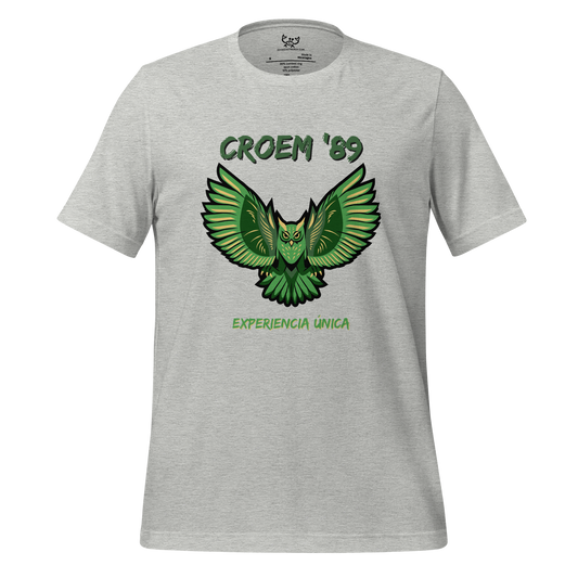 Image of a heather color t-shirt with a stylized green owl with the words "CROEM 89 experiencia unica".