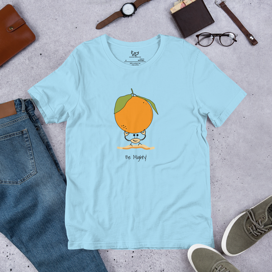 Image of an ocean blue t-shirt with a ghost crab holding an orange design and the words "be mighty".