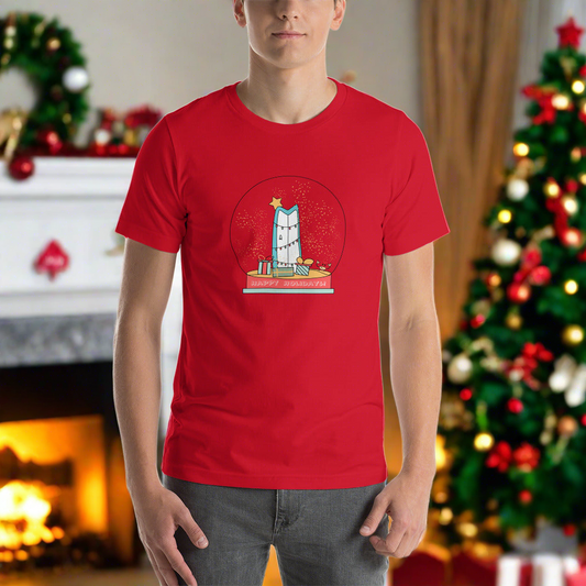 Image of a red t-shirt with a paddle board decorated as a Christmas tree in a snow globe design with the words "happy holidays".